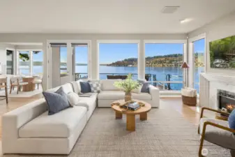 Designed for both gathering and retreat, the recently updated entertainment spaces flow together effortlessly, opening to the deck and sparkling lake.