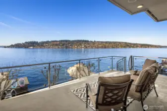 The picturesque deck overlooking the serene lake.