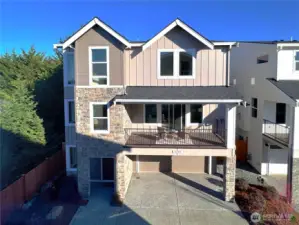 The Glacier Home Plan. All photos, renderings, site maps, and floorplans are for visualization purposes only. Plans, colors, building orientation, finishes, home outlook, and other details can and WILL vary. Striking three-level Glacier plan showcases a modern Craftsman façade with brick accents, vertical siding, and oversized windows for maximum natural light. Covered balcony and welcoming entry set the tone for refined living in Bothell’s Foxmoore community, close to Canyon Park conveniences and I-405 access.