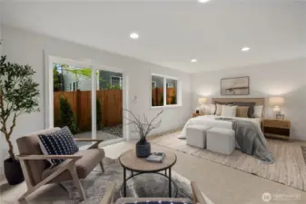 Lower-Level Bedroom or Bonus Suite: Expansive lower-level suite with multiple windows and direct patio access offers flexibility for use as a private guest retreat, media room, or home office. The generous layout provides comfort and convenience with endless possibilities for customization.    Photos are from the model home at Foxmoore and for visualization purposes only. Plans, colors, building orientation, finishes, home outlook, and other details can and WILL vary.