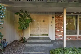 Double door entry with covered front patio