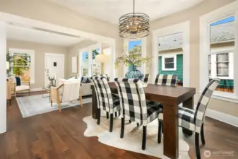 Dining room with bay window overlooking patio.