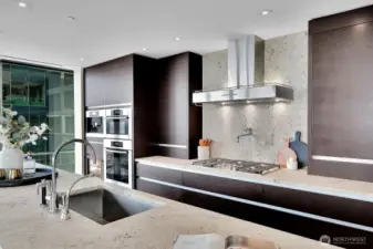 Sub Zero and Miele appliances are in pristine condition in this unit.