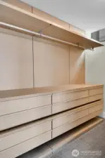 Walk-in closet in the primary bedroom.