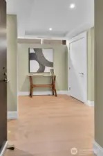 A welcoming entry awaits at this residence with large display space for art or collectibles.