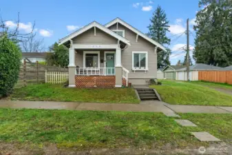 Classic Craftsman Bungalow with Covered Porch and Detached Garage