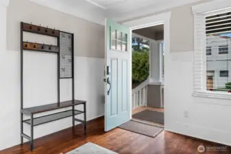 Welcoming Entry with Rich Hardwood Floors and Craftsman Charm