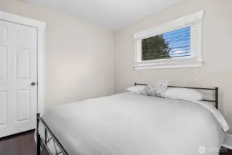 Cozy Bedroom with Hardwood Floors and Ample Closet Space