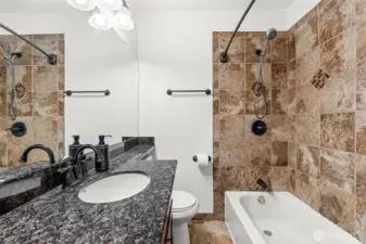 Full Bath with Granite Vanity and Stone Tile Surround