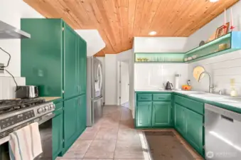 Fresh appliances join a lively kitchen.