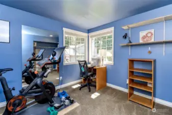 Another upstairs bedroom currently being used as a workout room