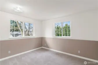 One of the upstairs bedroom with fresh paint and carpet.