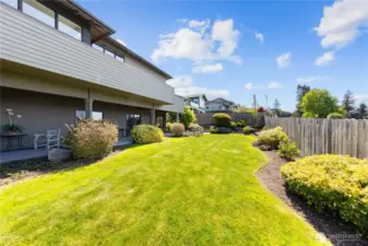 Large fully fenced yard with EZ to maintain landscape