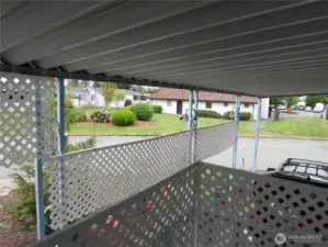 Open grassy area ( behind club house) across from front of home.