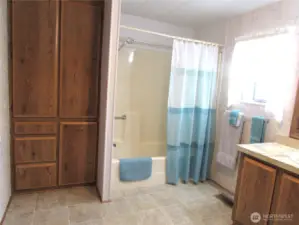 Master bath w/ tub/shower & more storage comparments.