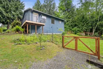 fenced yard with double gate.