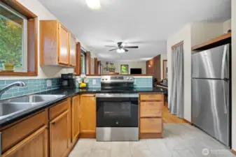 Beautiful tile backsplash adds a pop of color
