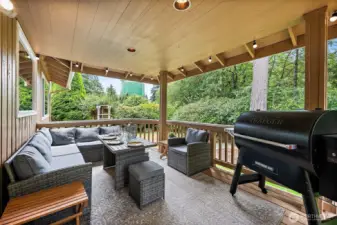 The large outdoor, covered deck is a perfect spot for entertaining right off the kitchen. It is truly a great outdoor living space.