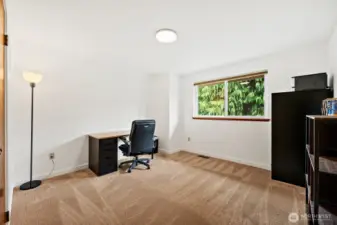 The third bedroom is currently being used as an office.