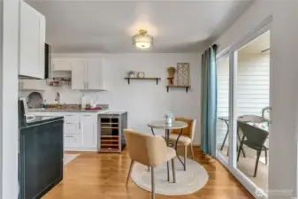 Kitchen dining with slider accesses the private view deck