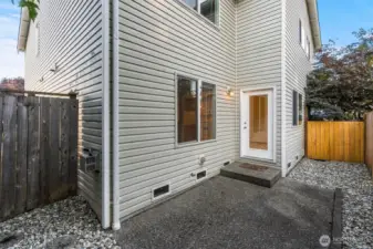 Back patio is fully fenced with access from inside or outside.