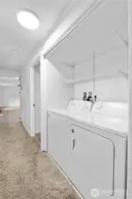 Utility area conveniently located between rooms
