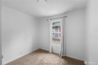 This is the smallest of three bedrooms, could be a nursery, office, tv room, whatever you would like.