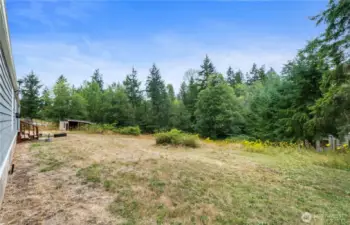 There is an outbuilding that likely needs to be taken down, do not enter, or enter at your own risk.