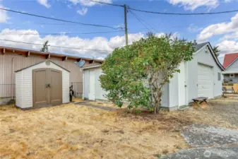 Locking garden shed at the side of the garage.