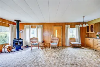 Front room with eating space for formal dining with built ins to the right.