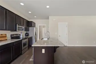 The door at back wall leads to large understair storage.