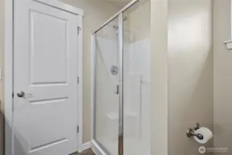 Shower stall in ensuite primary bathroom