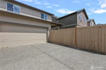 Entry to the garage from the alley side in back.