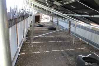 Chicken coop under the solar structure.