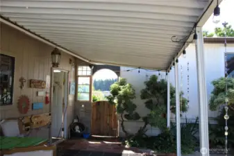 Carport off of the garage.
