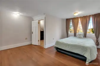 Large east-facing bedroom with closet on the left, also accessible from the hallway.