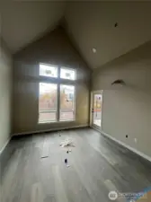 Living area with door to right leading to back patio