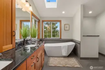 Double vanity with granite, generous soaking tub and extra large shower