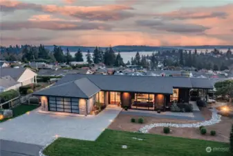 Nestled within the coveted Vuecrest community, this custom-built residence is more than a home—it’s a work of art.