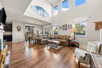 Elegant Touches Throughout – Engineered hardwood flooring, wood-wrapped windows, and custom wood valances.