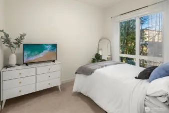 Primary Bedroom With Large Window