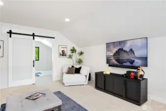 Barn door cleverly separates 3rd floor big room from exercise/den/bdrm area...you decide