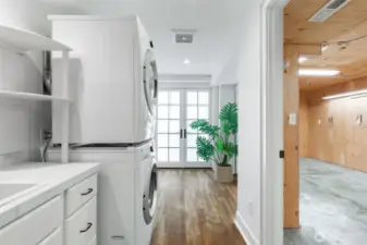 Lower level laundry and workshop.