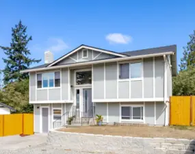 Welcome Home! New roof, lots of parking and very low maintenance yard