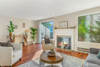 Beautiful living roomwith wood burning fireplace.
