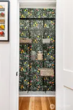 Custom wallpaper in walk-in pantry.
