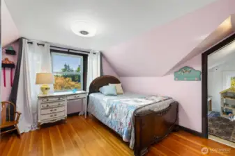 “Third bedroom upstairs with generous closet space.”