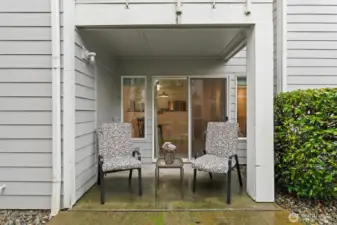 Patio with access via sliding glass door and large locked storage room