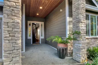 Thanks for taking a look!  Gracious stone-columned, covered entry with 8' door & sidelights with plantation shutters. Please reach out for any questions on anything!!