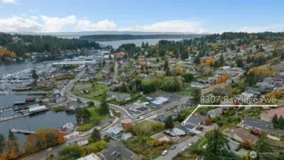 Drone view of Gig Harbor Bay.  Vacant lot is next to new construction on 8307 Bayridge.  Gig Harbor Bay has many moorage options with private and public docs.  The bay is very protected.